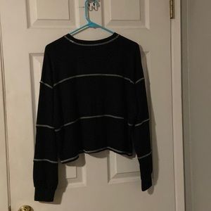 Black long sleeved shirt with white seams
